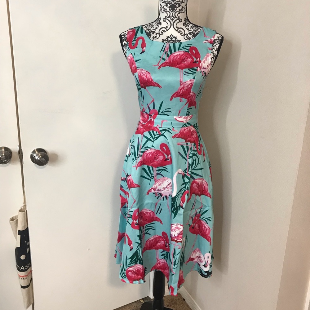 Pink and blue flamingo tiki dress with palm leaves